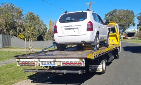 Sold car loaded onto the tow truck for free pickup in Melbourne